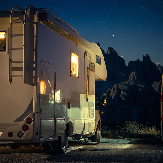 RV camping in the mountains at night