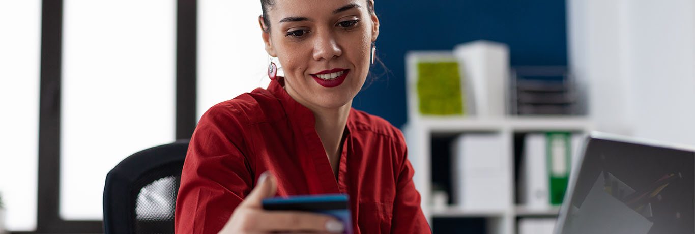 Woman holding a credit card